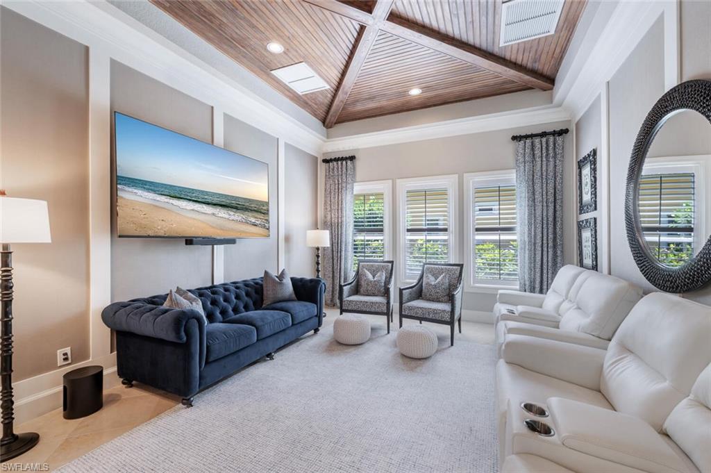 3086 Aviamar Circle Naples, FL 34114 - Photo 5 of 50 a living room with furniture and a large window