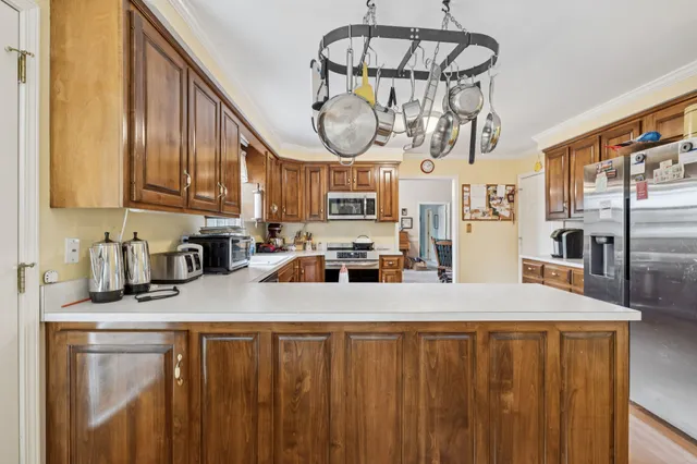 a view of roof deck with patio