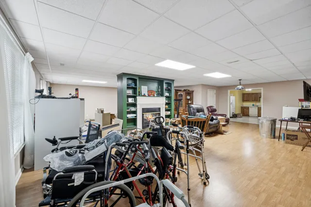 a kitchen with stainless steel appliances granite countertop a refrigerator sink and cabinets