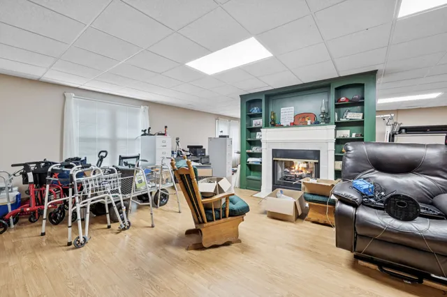 a kitchen with stainless steel appliances granite countertop a refrigerator sink and stove