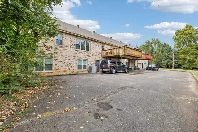 an aerial view of a city with lots of residential buildings