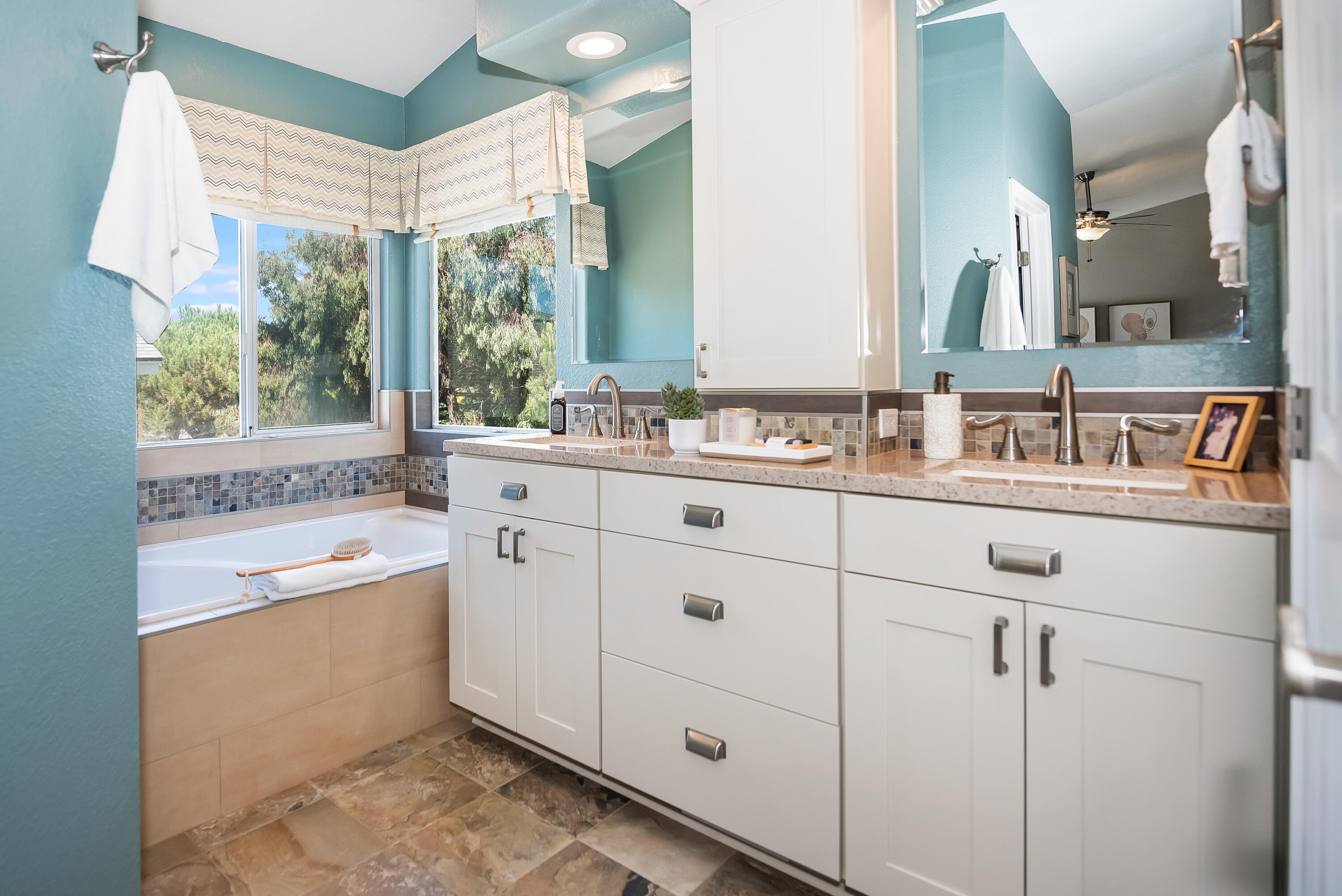 1328 Glen Ellen Lane Lompoc, CA 93436 - Photo 15 of 30 a bathroom with a double vanity sink mirror and bathtub