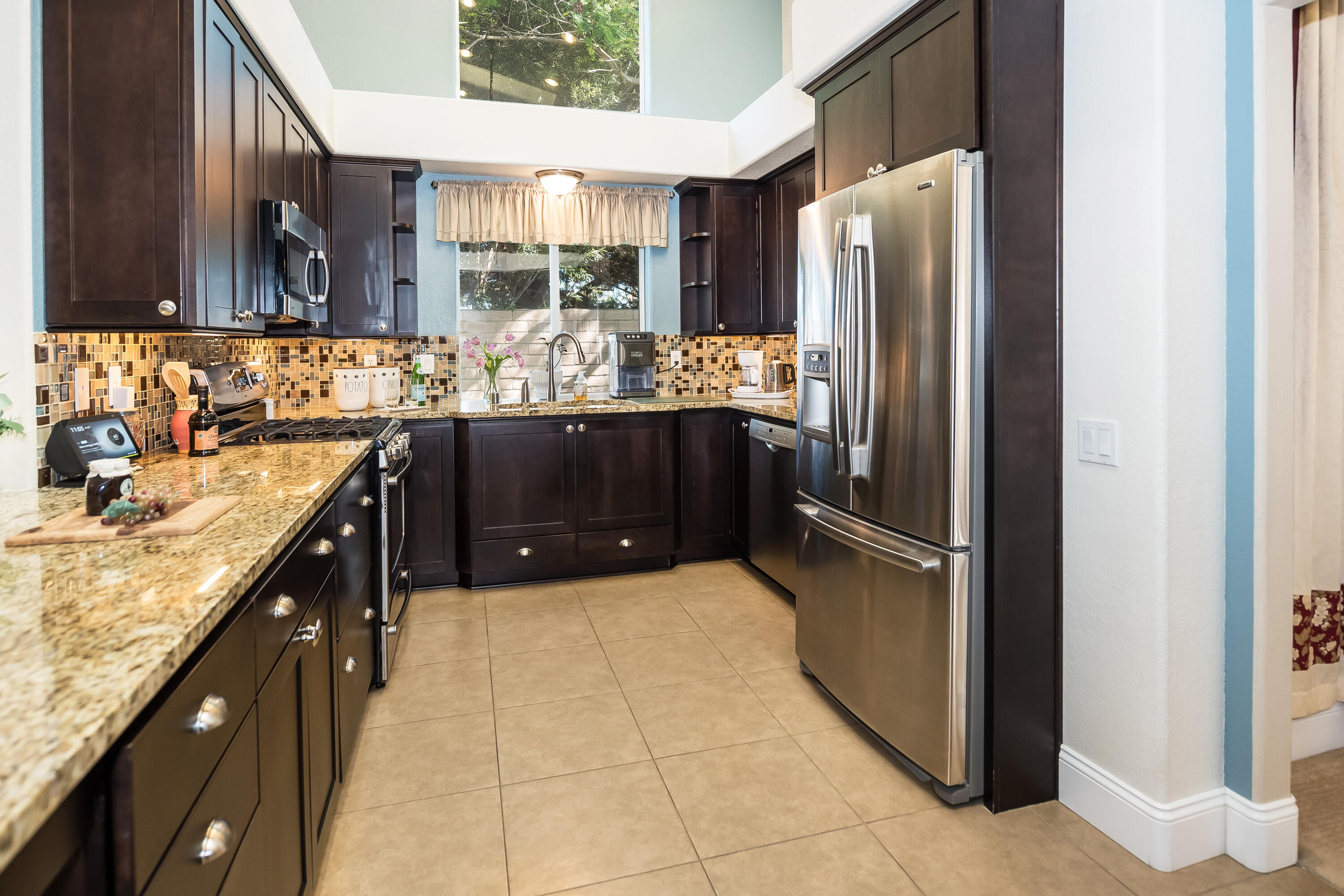1328 Glen Ellen Lane Lompoc, CA 93436 - Photo 5 of 30 a kitchen with stainless steel appliances granite countertop a refrigerator and a sink