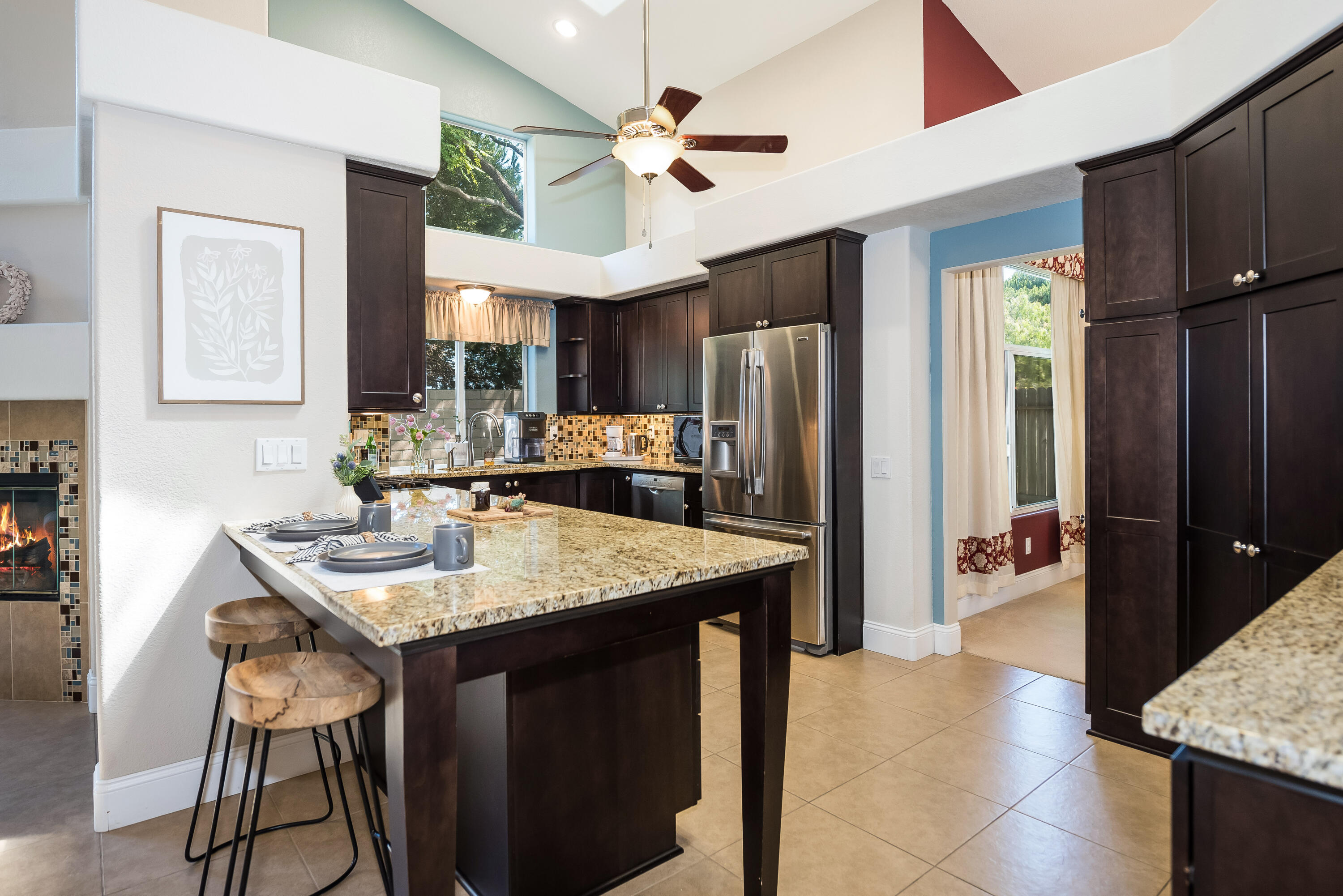 1328 Glen Ellen Lane Lompoc, CA 93436 - Photo 6 of 30 a kitchen with stainless steel appliances granite countertop a sink refrigerator and cabinets