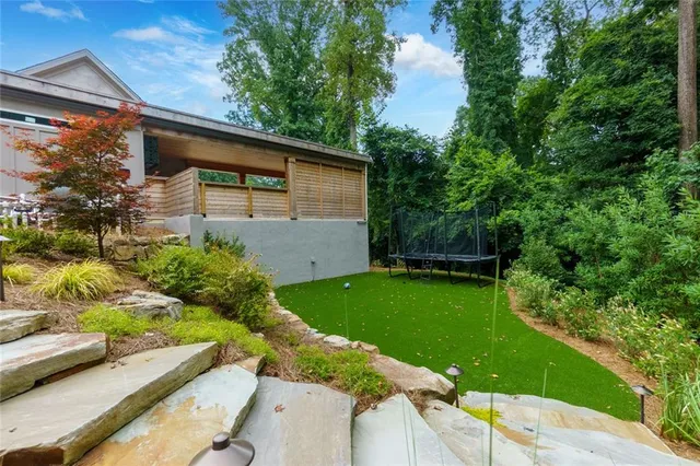 a living room with furniture and window