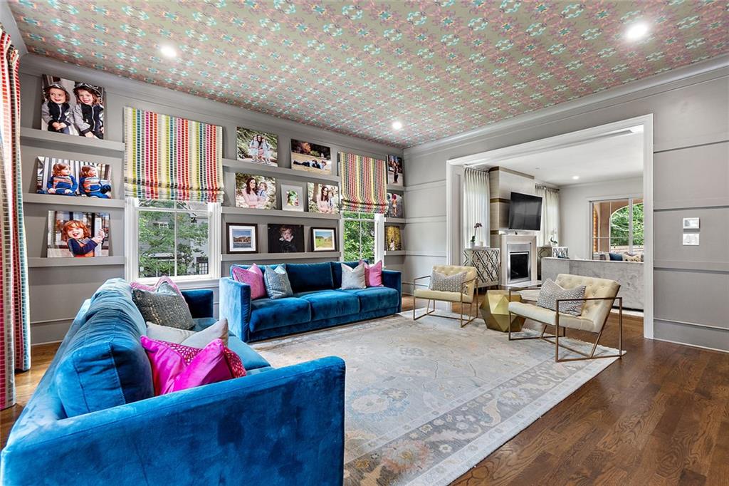 91 Park Circle Northeast Atlanta, GA 30305 - Photo 18 of 80 a living room with furniture or couch and a bookshelf
