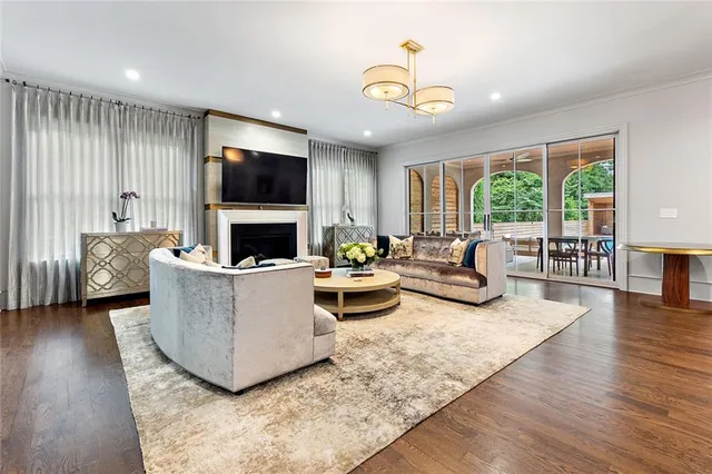 a kitchen with stainless steel appliances a sink stove and cabinets