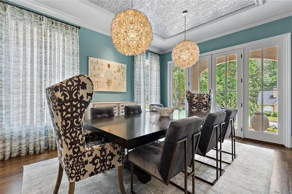 a view of entryway with wooden floor