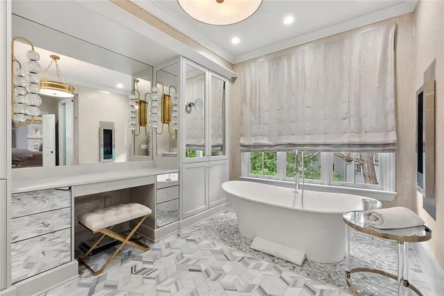 a view of a dining room with furniture and window