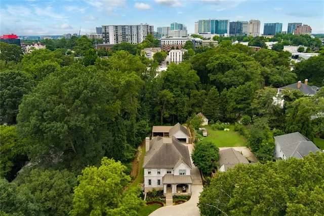 an aerial view of a house with a garden