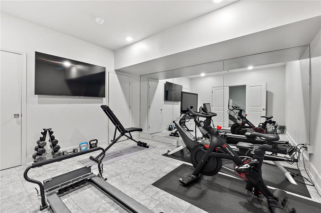 91 Park Circle Northeast Atlanta, GA 30305 - Photo 61 of 80 a view of a room with gym equipment