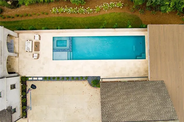 a living room with furniture or couch and a bookshelf