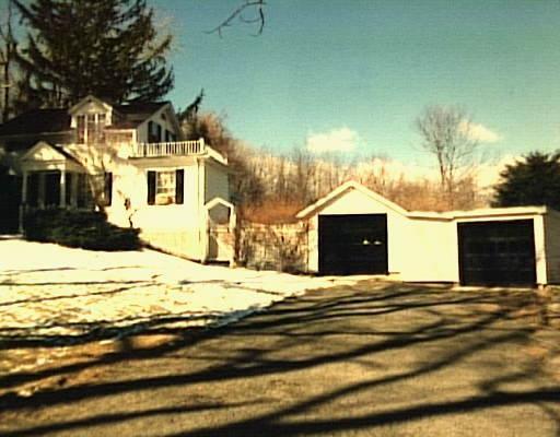 300 West Lane Ridgefield, CT 06877 - Photo 1 of 1 a view of a house with a yard