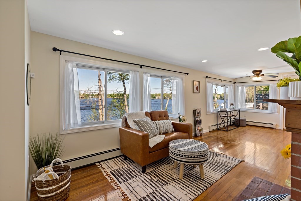 55 Alpine Road Weymouth, MA 02189 - Photo 17 of 31 a living room with furniture and a large window