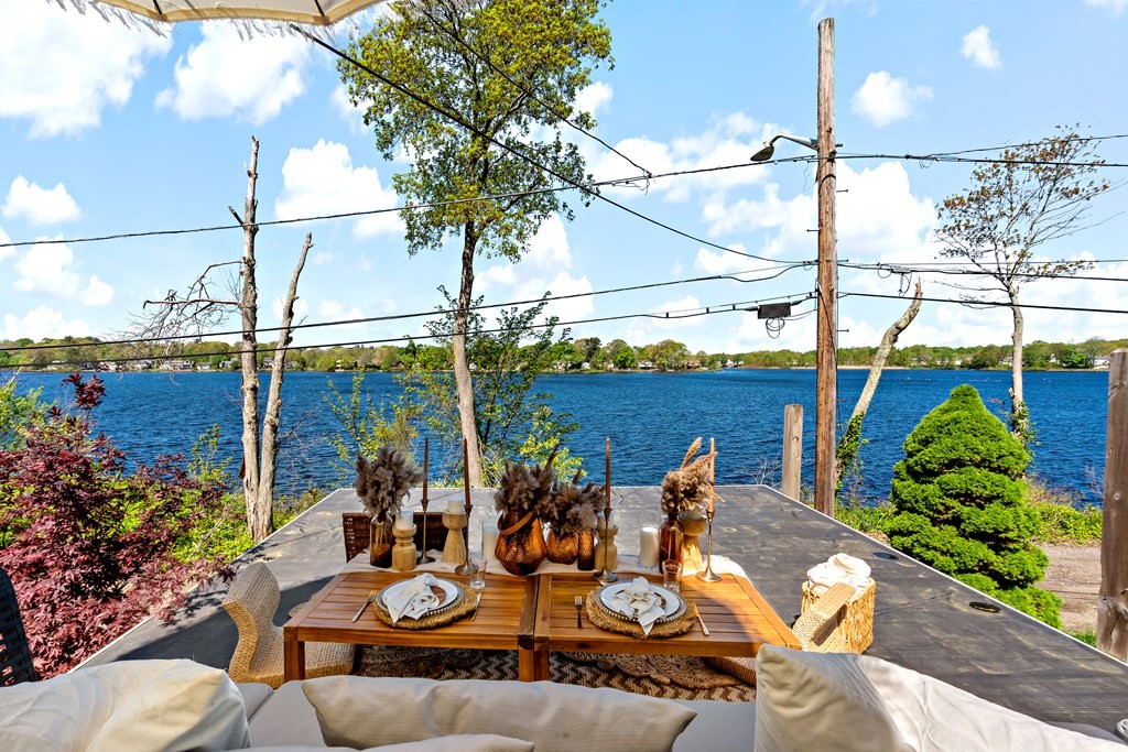 55 Alpine Road Weymouth, MA 02189 - Photo 22 of 31 a view of a balcony with chairs and potted plants