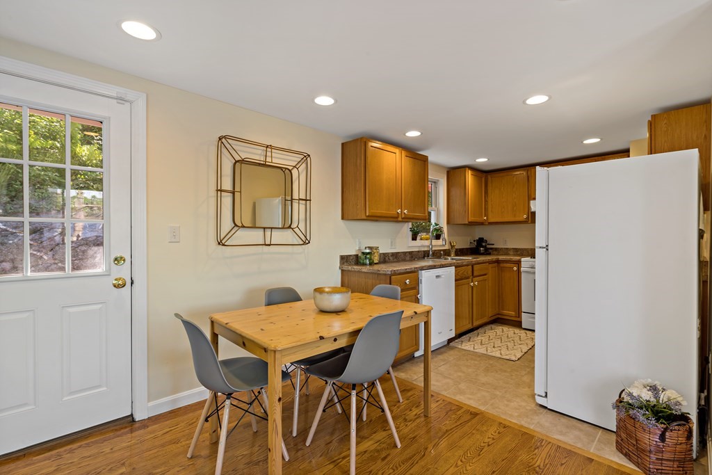 55 Alpine Road Weymouth, MA 02189 - Photo 27 of 31 a view of a dining room with furniture and wooden floor