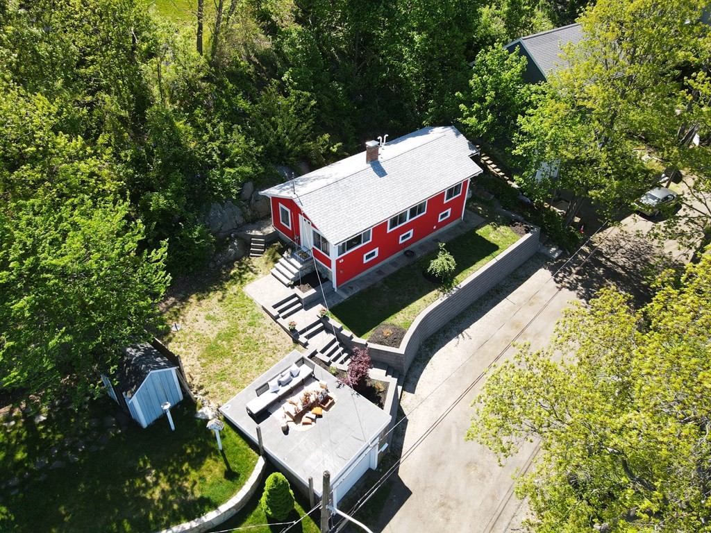 55 Alpine Road Weymouth, MA 02189 - Photo 28 of 31 an aerial view of a house with swimming pool and red chairs