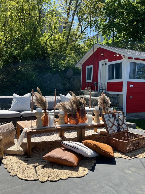 55 Alpine Road Weymouth, MA 02189 - Photo 30 of 31 a view of a house with backyard water fountain and sitting area
