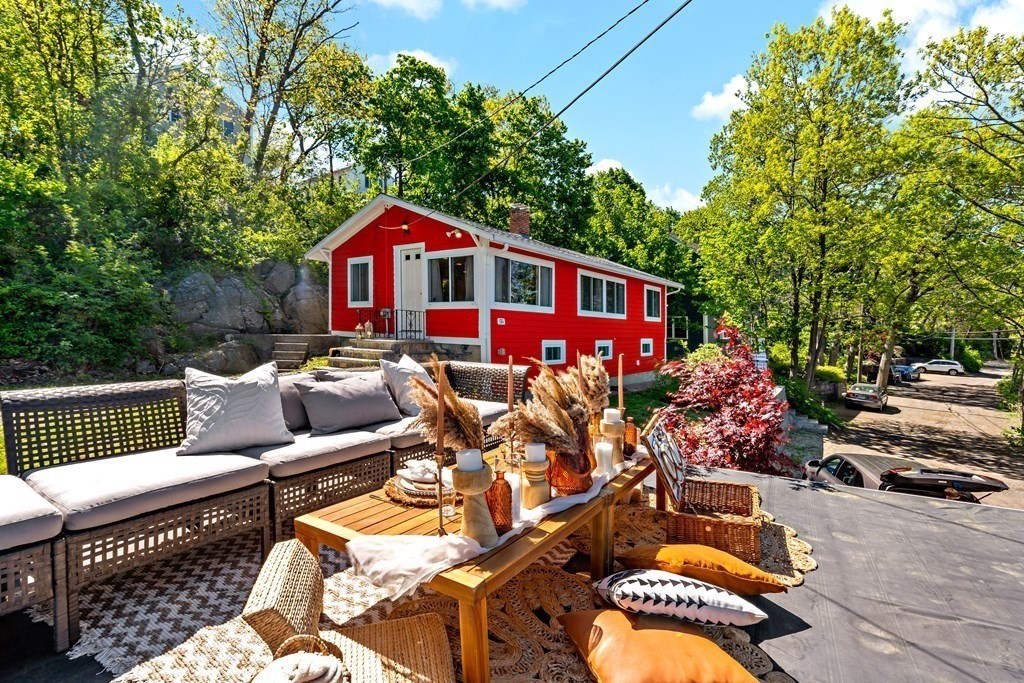 55 Alpine Road Weymouth, MA 02189 - Photo 6 of 31 a view of a patio with couches table and chairs and potted plants