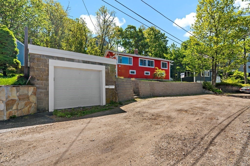 55 Alpine Road Weymouth, MA 02189 - Photo 9 of 31 a front view of a house with trees