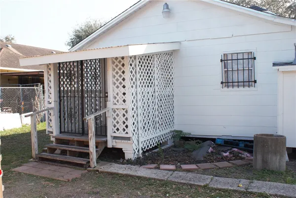 a view of a porch with a bench