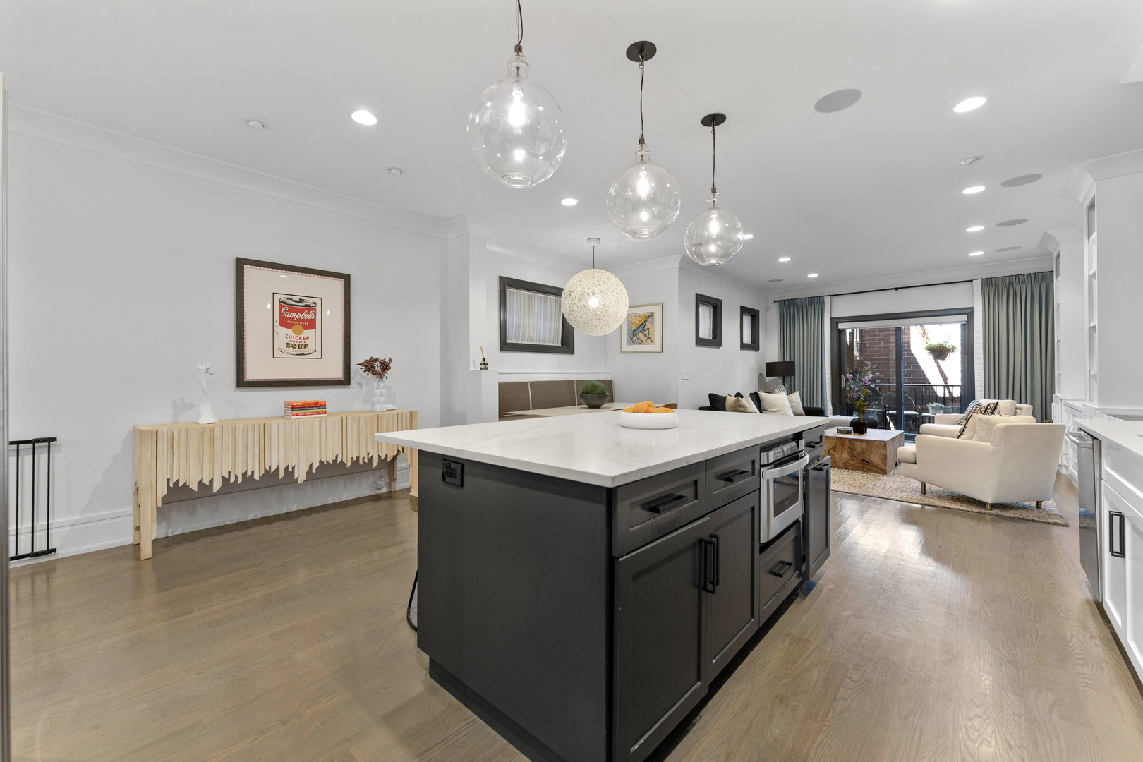 2040 North Burling Street, Unit 1 Chicago, IL 60614 - Photo 13 of 29 a large kitchen with stainless steel appliances lots of counter space