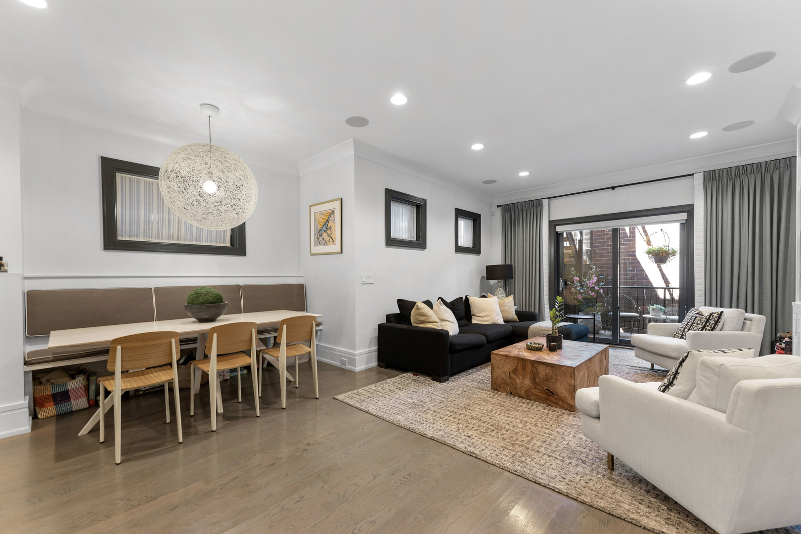 2040 North Burling Street, Unit 1 Chicago, IL 60614 - Photo 14 of 29 a living room with furniture and a large window