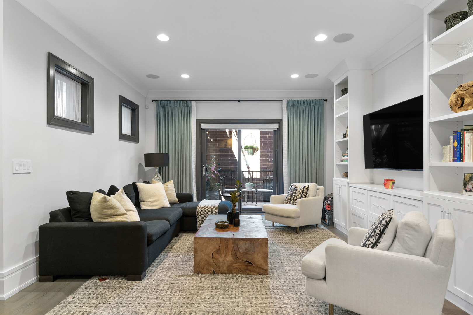 2040 North Burling Street, Unit 1 Chicago, IL 60614 - Photo 15 of 29 a living room with furniture and a flat screen tv