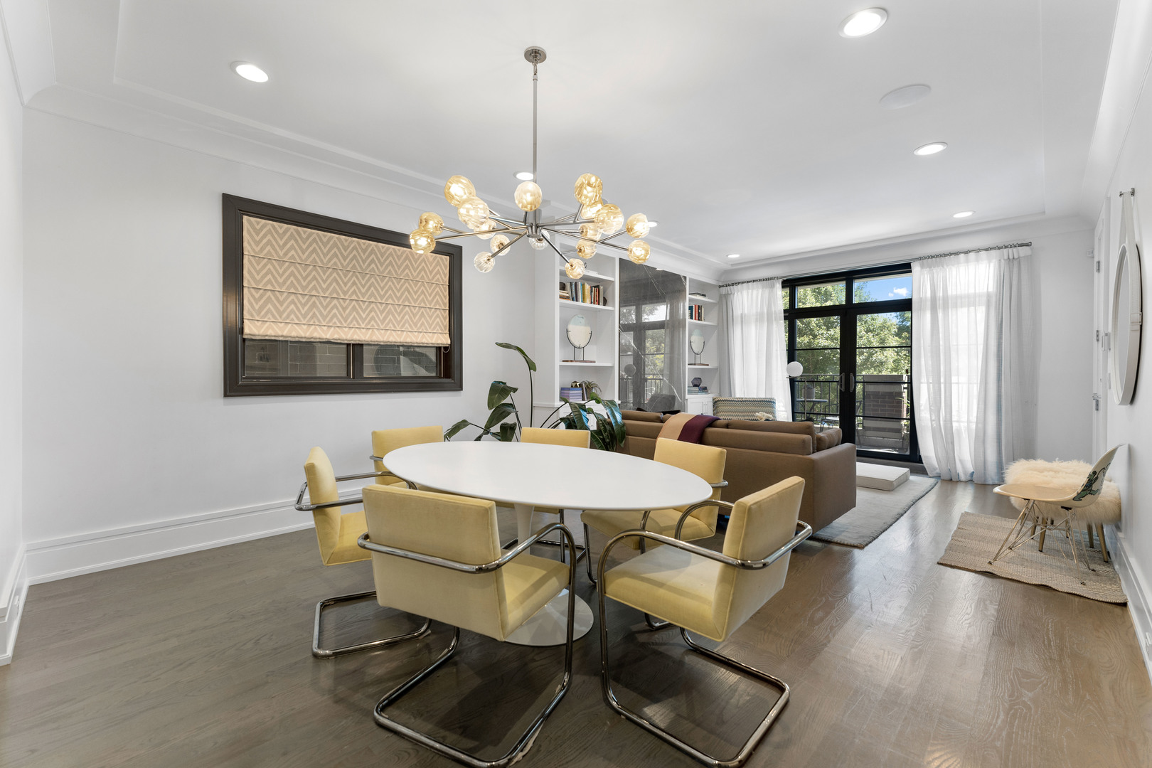 2040 North Burling Street, Unit 1 Chicago, IL 60614 - Photo 6 of 29 a view of a dining room with furniture window and outside view
