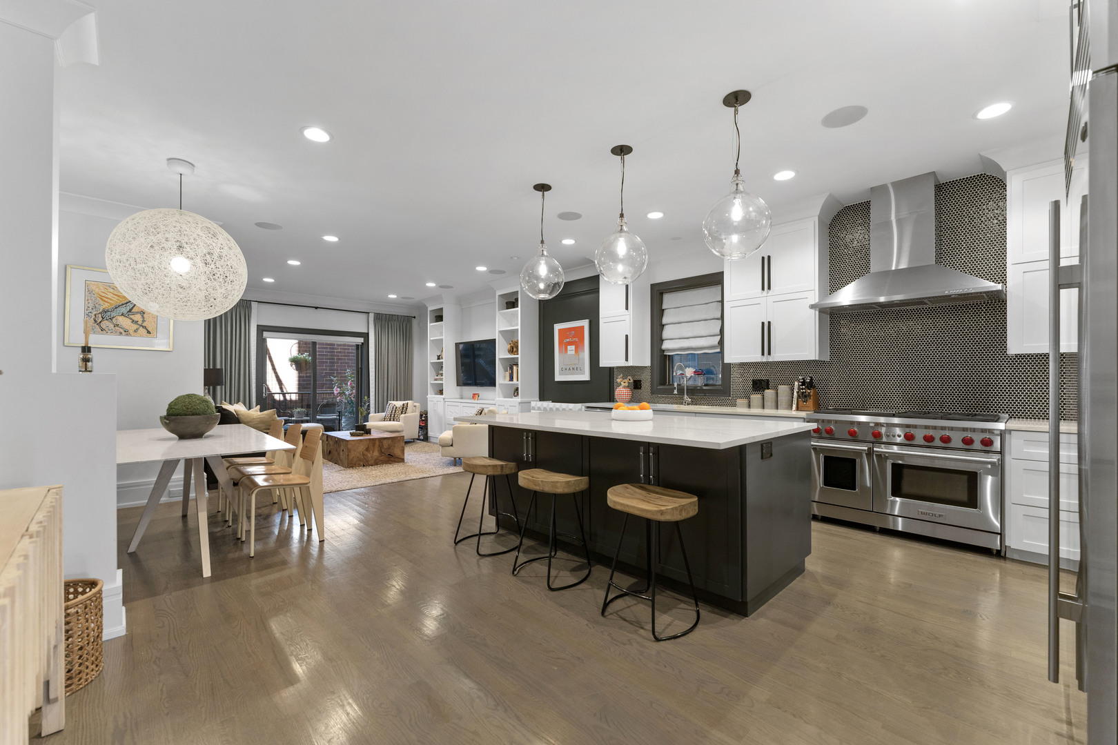2040 North Burling Street, Unit 1 Chicago, IL 60614 - Photo 9 of 29 a large kitchen with a table and chairs in it