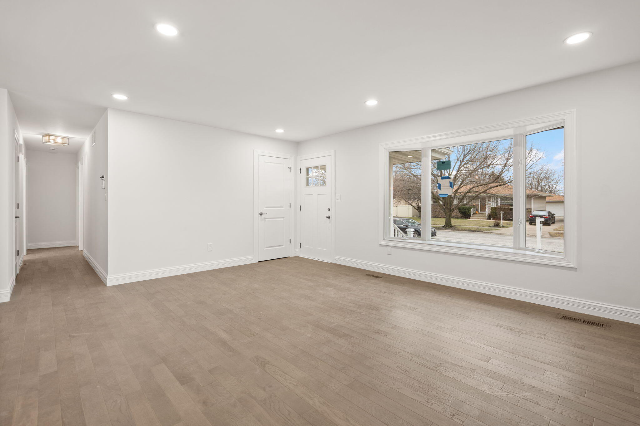 8749 Monroe Avenue Munster, IN 46321 - Photo 12 of 33 a view of an empty room with a window