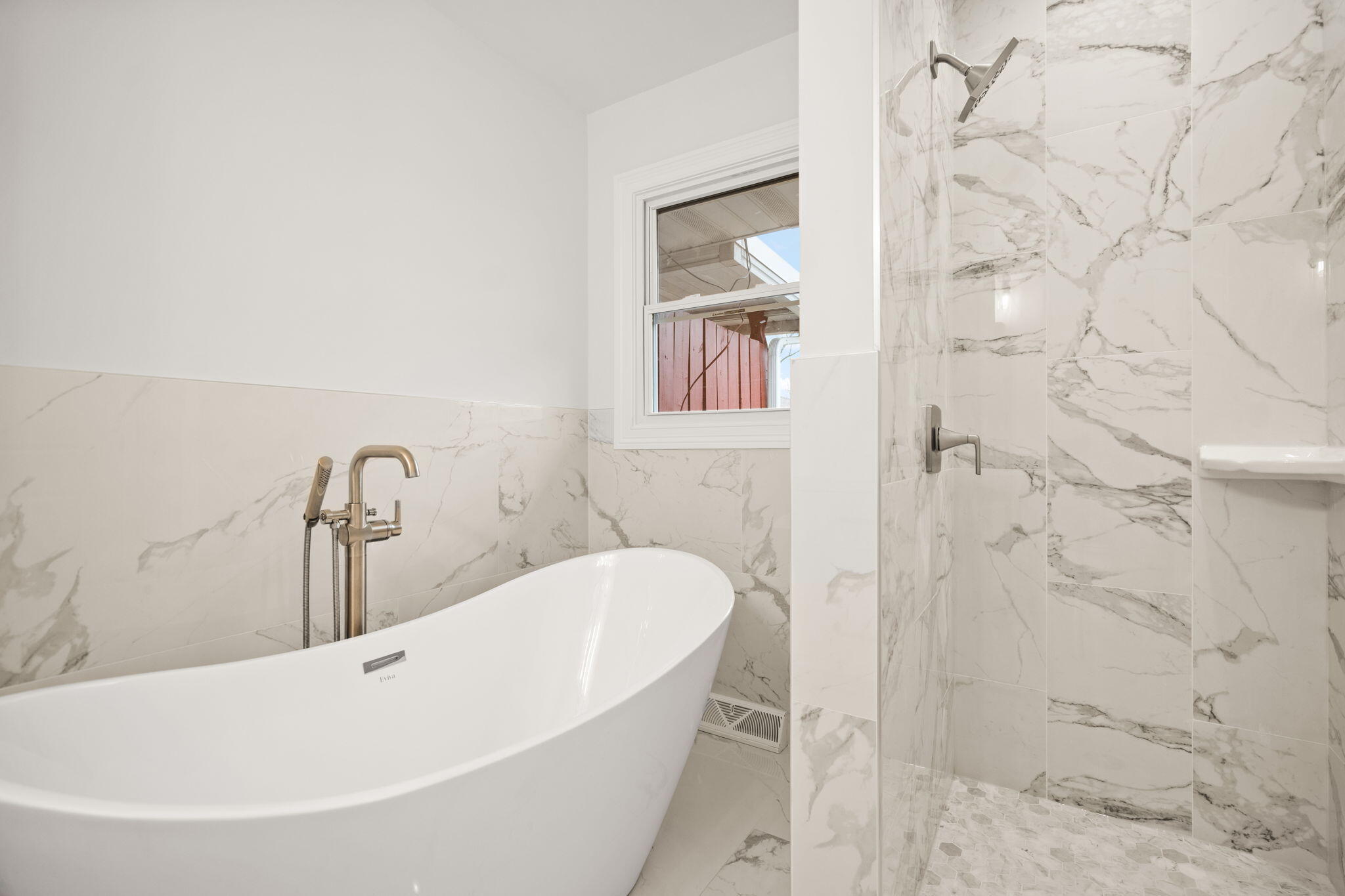 8749 Monroe Avenue Munster, IN 46321 - Photo 16 of 33 a bathroom with a bathtub and shower