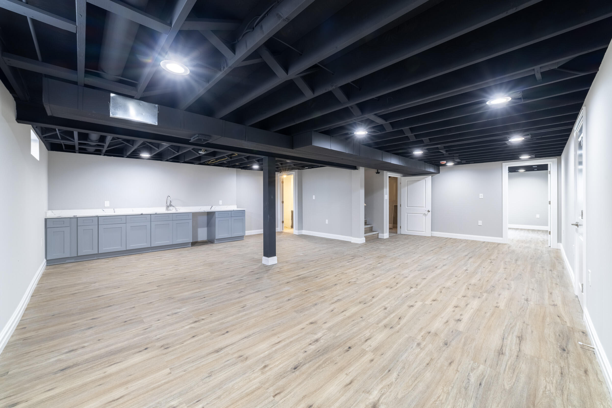 8749 Monroe Avenue Munster, IN 46321 - Photo 23 of 33 a view of an empty room with wooden floor
