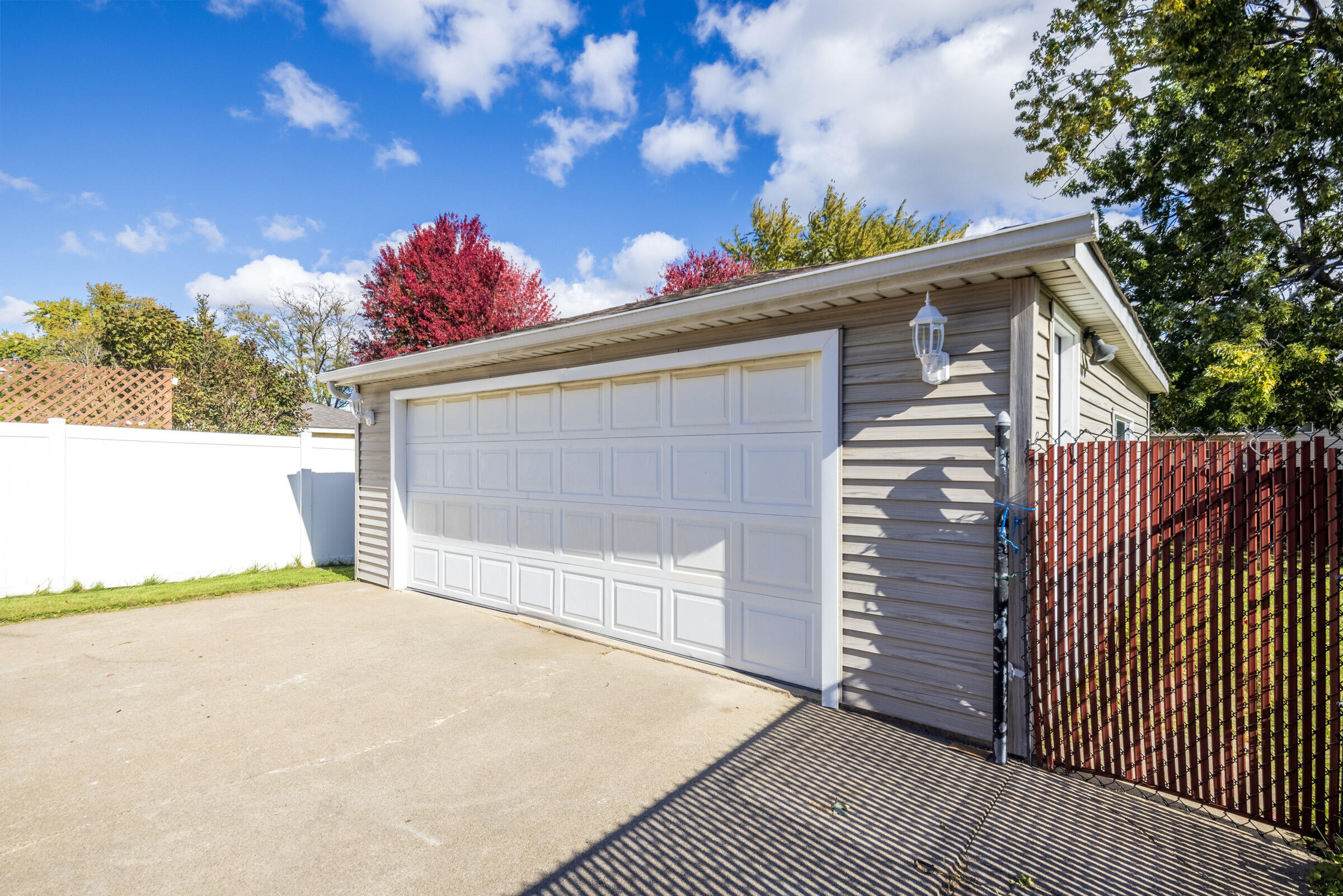 8749 Monroe Avenue Munster, IN 46321 - Photo 3 of 33 a view of a house with a garage