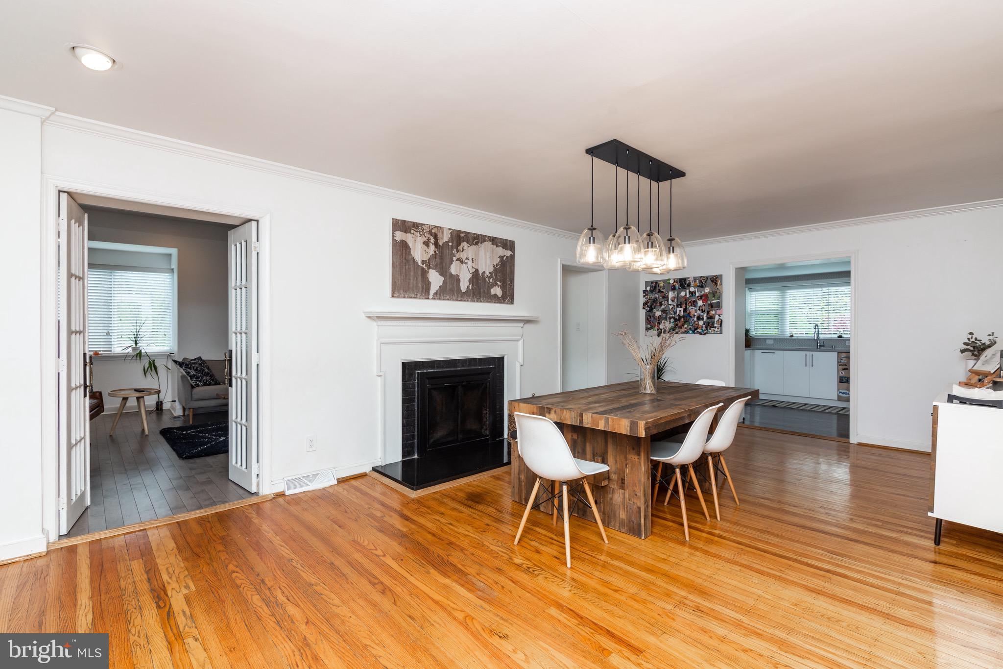 518 East Spring Avenue Ardmore, PA 19003 - Photo 3 of 38 Dining room with hardwood flooring and fireplace