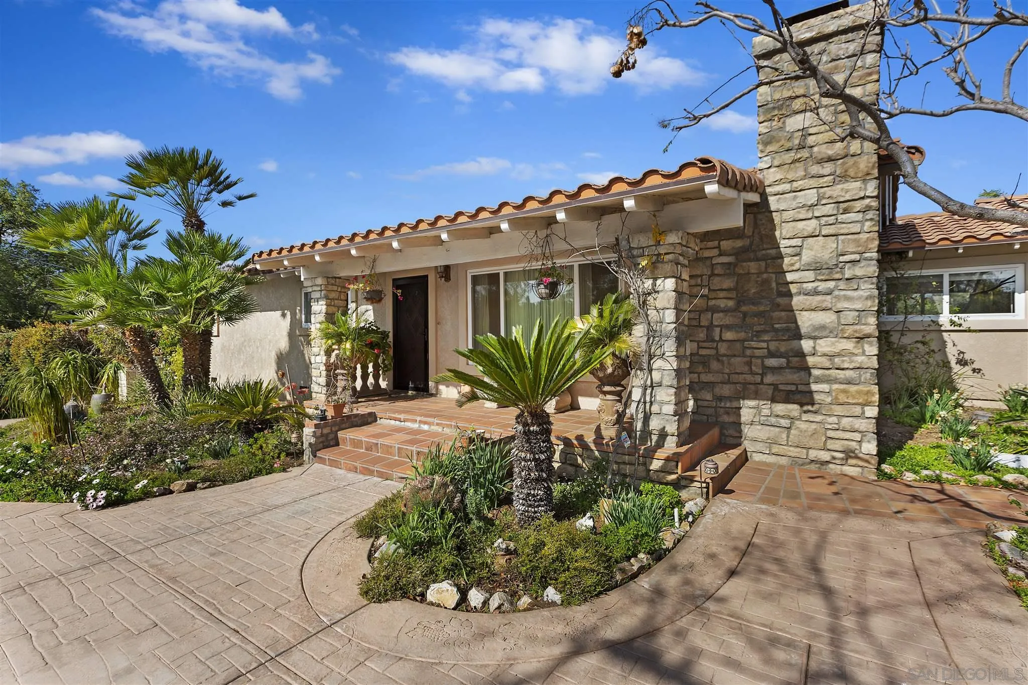 15217 Hilltop Circle Poway, CA 92064 - Photo 2 of 69 a front view of a house with a yard