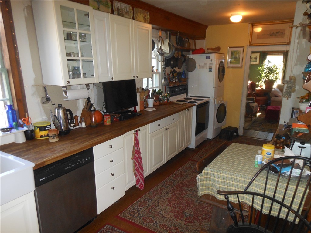 89 East Killingly Road Foster, RI 02825 - Photo 17 of 40 KITCHEN W/DINING AREA & LAUNDRY