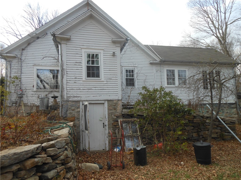 89 East Killingly Road Foster, RI 02825 - Photo 4 of 40 EXTERIOR RIGHT SIDE W/ WALKOUT BASEMENT