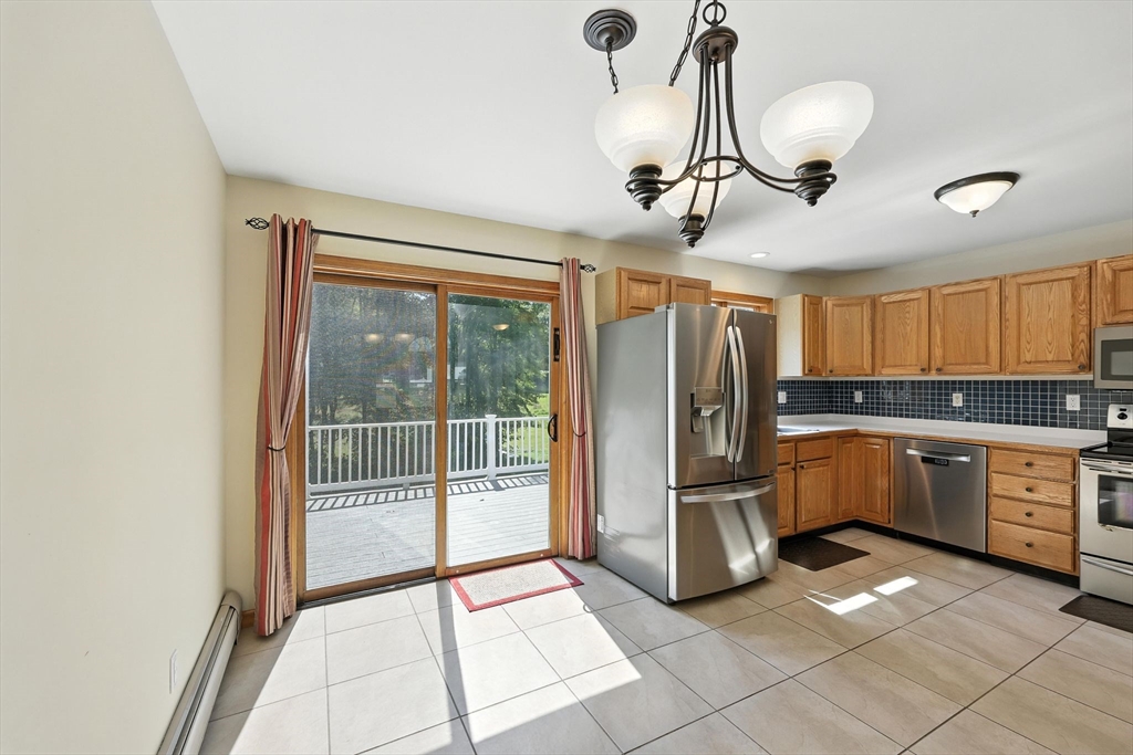 17 Glendale Road Southampton, MA 01073 - Photo 14 of 42 a kitchen with stainless steel appliances a refrigerator and microwave