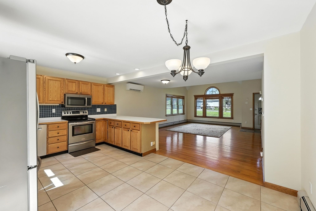 17 Glendale Road Southampton, MA 01073 - Photo 15 of 42 a large kitchen with a large counter top space appliances and cabinets