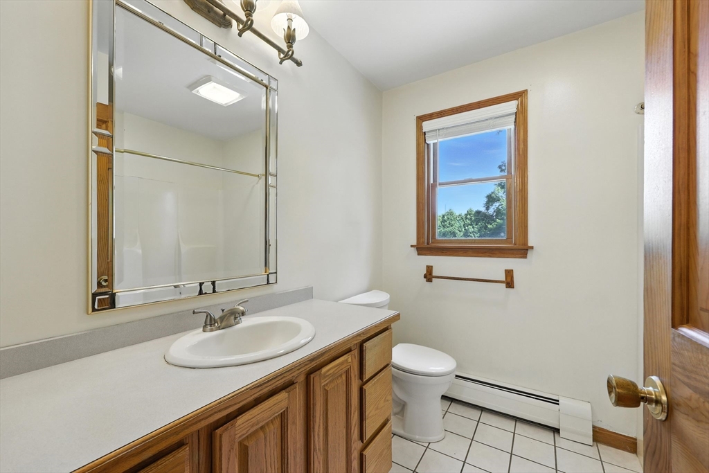 17 Glendale Road Southampton, MA 01073 - Photo 18 of 42 a bathroom with a sink and a mirror
