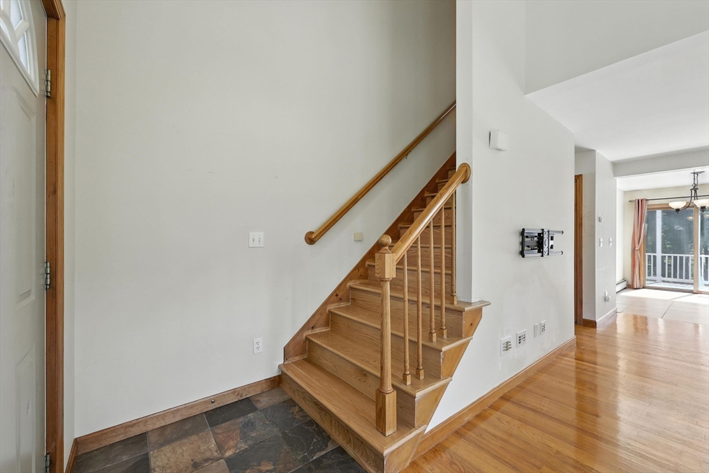 17 Glendale Road Southampton, MA 01073 - Photo 19 of 42 a view of entryway with wooden floor and stairs