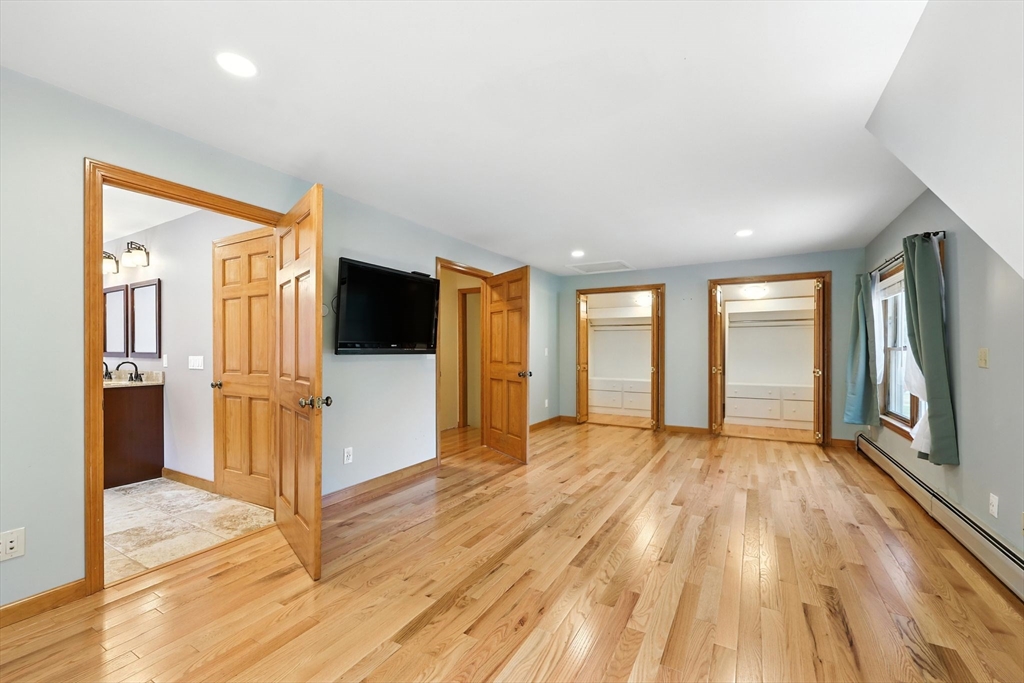 17 Glendale Road Southampton, MA 01073 - Photo 20 of 42 a view of an empty room with wooden floor and a window
