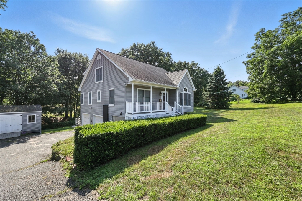17 Glendale Road Southampton, MA 01073 - Photo 2 of 42 a view of house with a big yard and potted plants