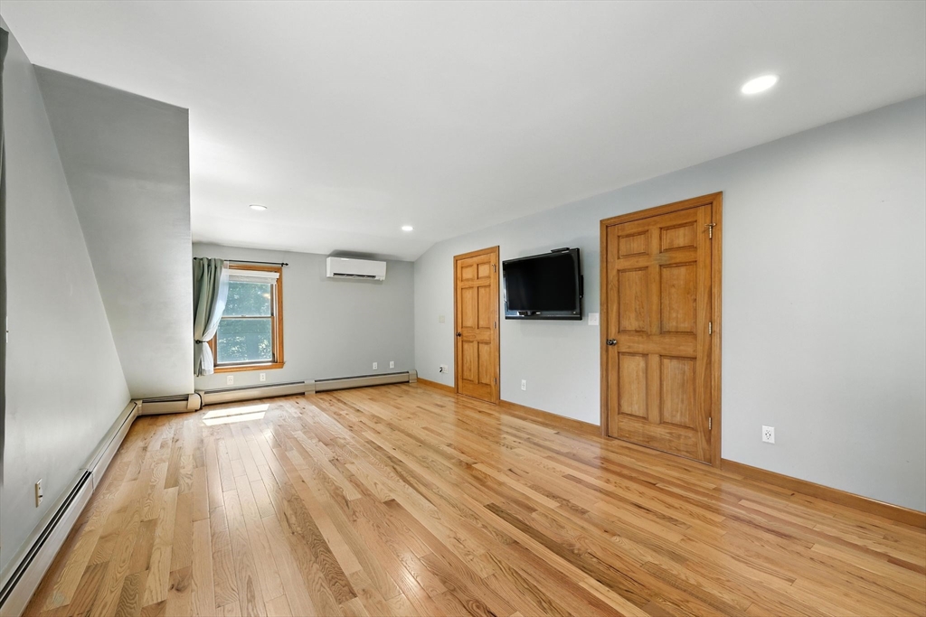 17 Glendale Road Southampton, MA 01073 - Photo 22 of 42 a view of empty room with wooden floor and window
