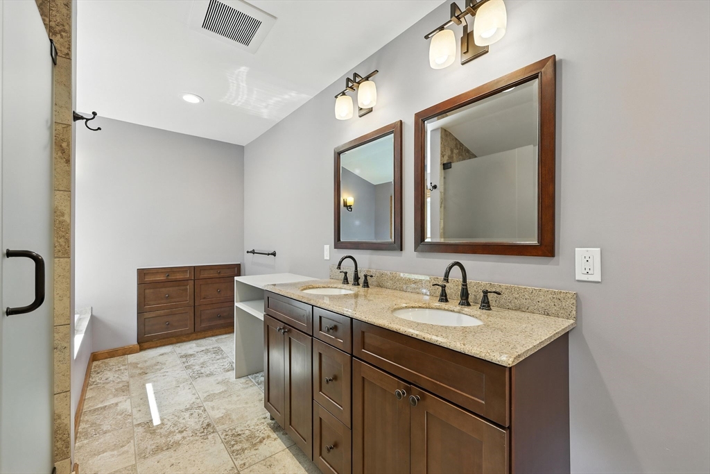 17 Glendale Road Southampton, MA 01073 - Photo 25 of 42 a en suite bathroom with a double vanity sink and a mirror