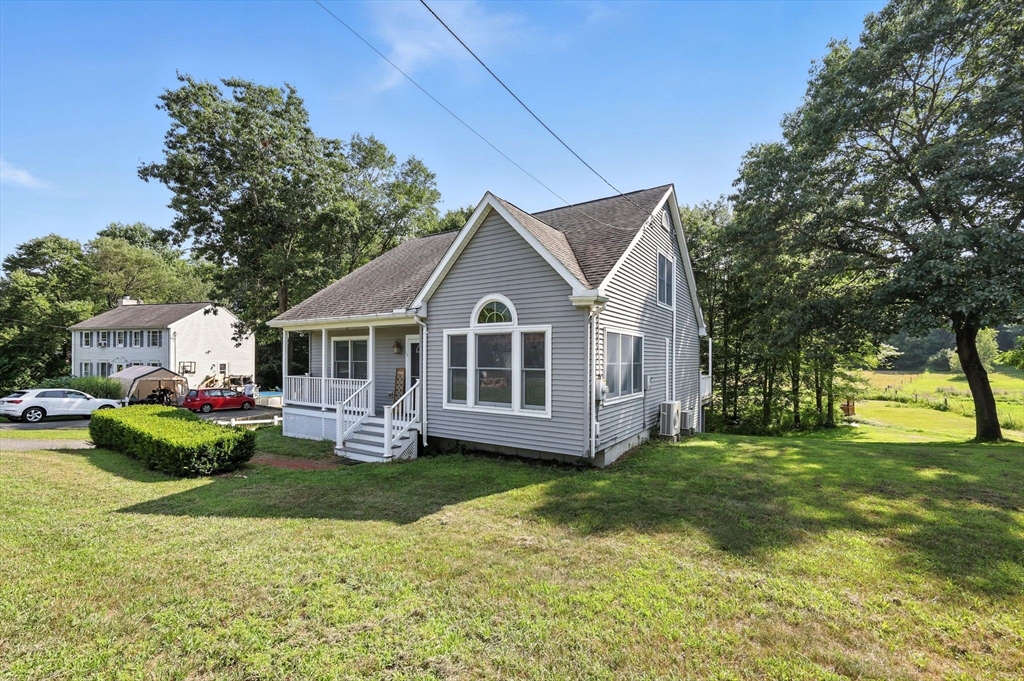 17 Glendale Road Southampton, MA 01073 - Photo 3 of 42 a front view of house with yard and green space