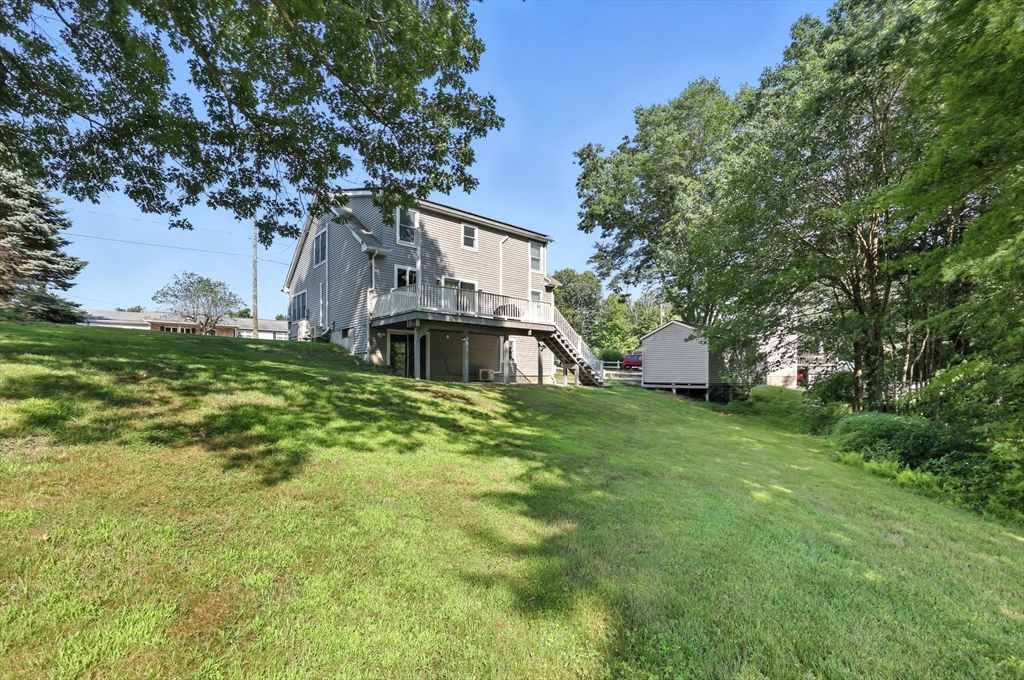17 Glendale Road Southampton, MA 01073 - Photo 35 of 42 a view of a house with a big yard plants and large trees