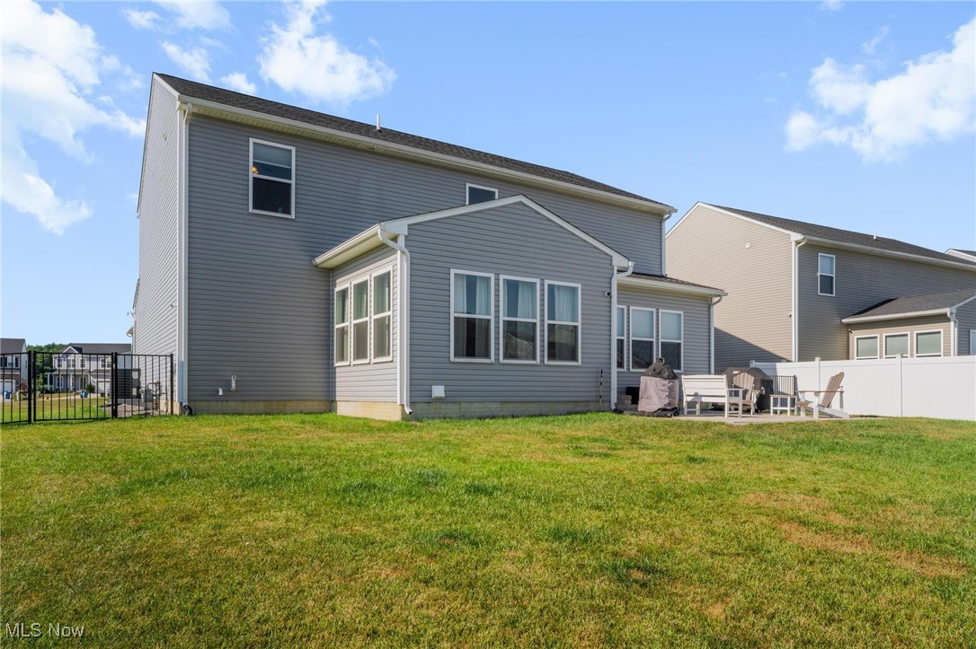 37174 Amber Way North Ridgeville, OH 44039 - Photo 35 of 40 Back of property featuring a patio area