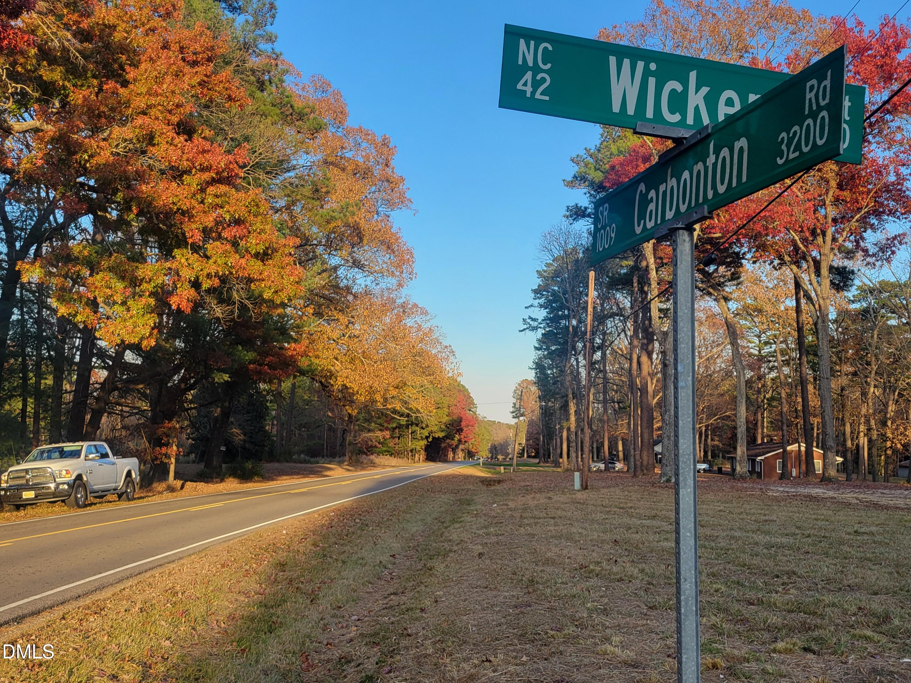 a view of road with trees